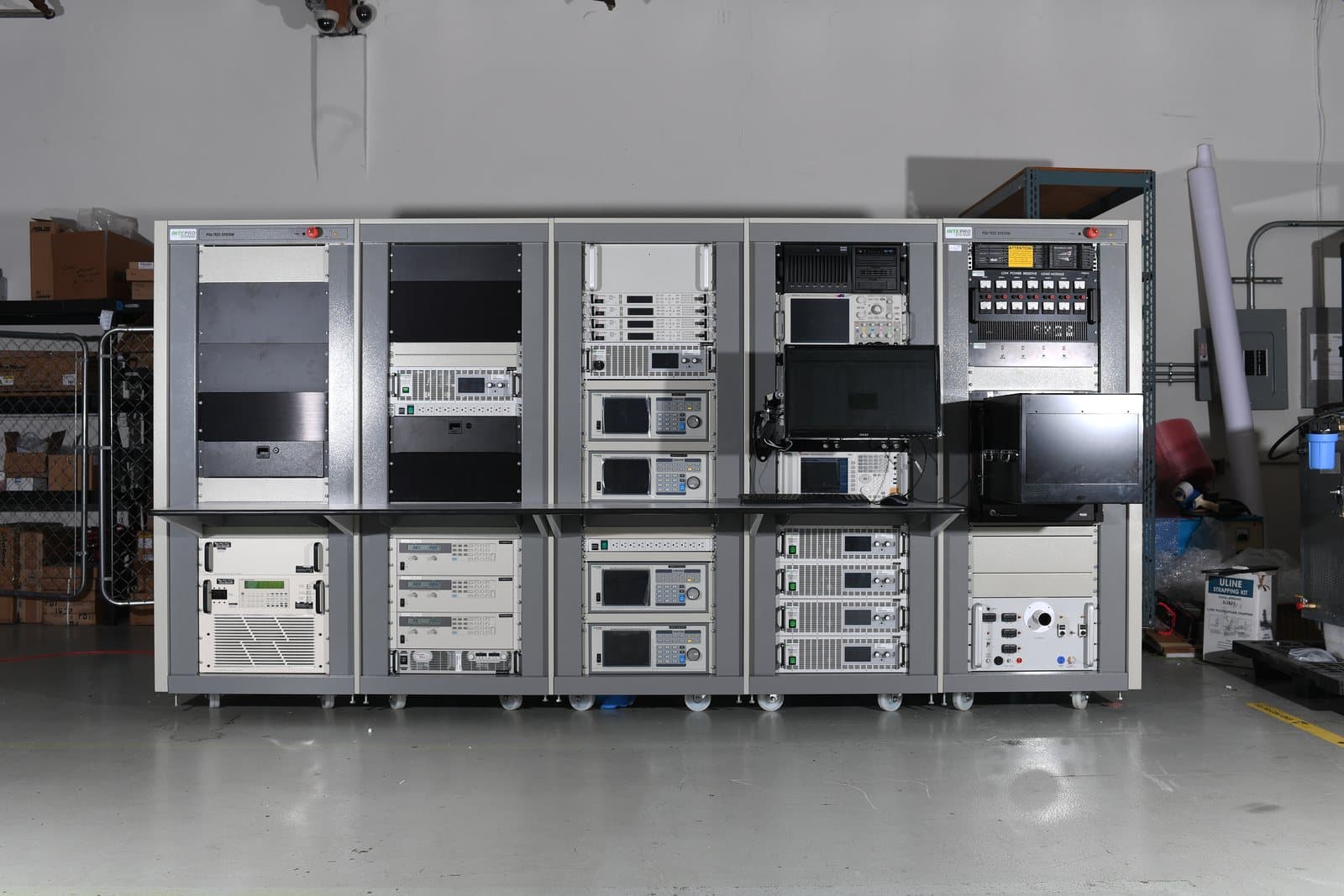 Five-bay Intepro rack row on the workshop floor, front elevation